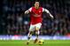 LONDON, ENGLAND - JANUARY 18: Mesut Oezil of Arsenal in action during the Barclays Premier League match between Arsenal and Fulham at Emirates Stadium on January 18, 2014 in London, England. (Photo by Clive Mason/Getty Images)