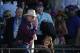 California Chrome co-owner Steve Coburn calls from the grandstand at Belmont Park after his horse finished fourth in the Belmont Stakes horse race, Saturday, June 7, 2014, in Elmont, N.Y. (AP Photo/Kathy Willens)