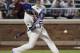 New York Mets' Juan Lagares hits an RBI double during the fourth inning of a baseball game against the Pittsburgh Pirates on Tuesday, May 27, 2014, in New York. (AP Photo/Frank Franklin II)