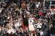 SAN ANTONIO, TX - JUNE 8: LeBron James #6 of the Miami Heat shoots against Kawhi Leonard #2 of the San Antonio Spurs in Game Two of the 2014 NBA Finals at AT&T Center on June 5, 2014 in San Antonio, Texas. NOTE TO USER: User expressly acknowledges and agrees that, by downloading and/or using this photograph, user is consenting to the terms and conditions of the Getty Images License Agreement. Mandatory Copyright Notice: Copyright 2014 NBAE (Photo by Nathaniel S. Butler/NBAE via Getty Images)