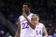 Mar 13, 2014; Kansas City, MO, USA; Kansas Jayhawks guard Andrew Wiggins (22) laughs while on the foul line during the second half against the Oklahoma State Cowboys in the second round of the Big 12 Conference college basketball tournament at Sprint Center. Kansas won 77-70 in overtime. Mandatory Credit: Denny Medley-USA TODAY Sports