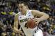 Michigan forward Mitch McGary (4) drives against Virginia Commonwealth in their third-round game of the NCAA college basketball tournament in Auburn Hills, Mich., Saturday March 23, 2013. (AP Photo/Paul Sancya)