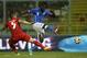 Italy forward Mario Balotelli, right, makes an attempt to score as Luxembourg defender Tom Schnell tackles him during a friendly World Cup preparation soccer match between Italy and Luxembourg in Perugia, Italy, Wednesday, June 4, 2014. Italy opens its Brazilian World Cup campaign against England in Group D on June 14 then faces Costa Rica on June 20 and Uruguay on June 24. (AP Photo/Luca Bruno)