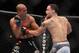 Frankie Edgar, right, in action against BJ Penn during their UFC fight at the TD Garden on Saturday, August 28, 2010 in Boston, MA. Edgar retained his UFC lightweight title via unanimous decision. (AP Photo/Gregory Payan)