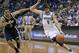 Minnesota Timberwolves guard Ricky Rubio (9), of Spain, tries to shake off Utah Jazz guard Trey Burke (3) on a drive during the fourth quarter of an NBA basketball game in Minneapolis, Wednesday, April 16, 2014. The Jazz won 136-130 in double overtime. (AP Photo/Ann Heisenfelt)