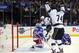 Jun 9, 2014; New York, NY, USA; Los Angeles Kings center Jeff Carter (77) celebrates with left wing Dwight King (74) after scoring a goal past New York Rangers goalie Henrik Lundqvist (30) during the first period in game three of the 2014 Stanley Cup Final at Madison Square Garden. Mandatory Credit: Brad Penner-USA TODAY Sports
