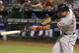 Cleveland Indians Lonnie Chisenhall follows through on a swing hitting a three run homer during the eighth inning of a baseball game against the Texas Rangers in Arlington, Texas, Monday, June 9, 2014. (AP Photo/LM Otero)