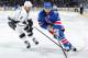 NEW YORK, NY - JUNE 09: Mats Zuccarello #36 of the New York Rangers skates the puck past Matt Greene #2 of the Los Angeles Kings during Game Three of the 2014 NHL Stanley Cup Final at Madison Square Garden on June 9, 2014 in New York City. (Photo by Scott Levy/NHLI via Getty Images)