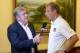 Sep 5, 2013; San Jose, COSTA RICA; ESPN reporter Boby Ley (left) interviews United States coach Jurgen Klinsmann at a press conference at the Costa Rica Marriott San Jose in advance of the FIFA World Cup Qualifier against Costa Rica. Mandatory Credit: Kirby Lee-USA TODAY Sports