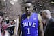 Duke's Jabari Parker (1) walks off the court after losing to Virginia in an NCAA college basketball game in the championship of the Atlantic Coast Conference tournament in Greensboro, N.C., Sunday, March 16, 2014. Virginia won 72-63. (AP Photo/Gerry Broome)