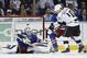 New York Rangers goalie Henrik Lundqvist (30) blocks a shot by Los Angeles Kings center Mike Richards (10) as Rangers defenseman Anton Stralman (6) helps defend in the second period during Game 3 of the NHL hockey Stanley Cup Final, Monday, June 9, 2014, in New York. (AP Photo/Kathy Willens)