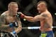 Jun 7, 2014; Albuquerque, NM, USA; Diego Sanchez (red) and Ross Pearson (blue) fight during their lightweight bout during UFC Fight Night 42 at Tingley Coliseum. Sanchez won via split decision. Mandatory Credit: Joe Camporeale-USA TODAY Sports