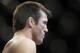 Chael Sonnen stands during a UFC mixed martial arts match against Anderson Silva in Oakland, California, Saturday, August 7, 2010. Silva won by submission in the fifth round to retain the championship. (AP Photo/Jeff Chiu)