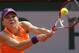 Romania's Simona Halep returns the ball to Russia's Maria Sharapova during their final match of the French Open tennis tournament at the Roland Garros stadium, in Paris, France, Saturday, June 7, 2014. (AP Photo/Michel Euler)