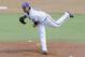 TCU pitcher Brandon Finnegan throws in the third inning of an NCAA college baseball super regional game against Pepperdine in Fort Worth, Saturday, June 7, 2014. (AP Photo/Matt Strasen)