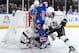 NEW YORK, NY - JUNE 09: Carl Hagelin #62 of the New York Rangers attempts to jam the puck past Jonathan Quick #32 of the Los Angeles Kings near the net during Game Three of the 2014 NHL Stanley Cup Final at Madison Square Garden on June 9, 2014 in New York City. (Photo by Scott Levy/NHLI via Getty Images)