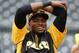 Pittsburgh Pirates' Gregory Polanco stretches during warm ups before a baseball game against the Chicago Cubs in Pittsburgh Tuesday, June 10, 2014. It will be Polanco's Major League debut. (AP Photo/Gene J. Puskar)