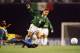 11 Jan 1996: Alberto Garcia Aspe of Mexico trips over Cornelius Huggins of St. Vincent during a game. Mexico won the game 5-0. Mandatory Credit: Stephen Dunn /Allsport