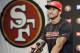 San Francisco 49ers quarterback Colin Kaepernick answers question during an NFL football press conference on Wednesday, June 4, 2014, in Santa Clara, Calif. Kaepernick received a new six-year contract extension Wednesday that keeps him with the franchise through the 2020 season. (AP Photo/Marcio Jose Sanchez)