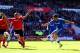 CARDIFF, WALES - MAY 11: Eden Hazard of Chelsea shoots past Steven Caulker of Cardiff City during the Barclays Premier League match between Cardiff City and Chelsea at Cardiff City Stadium on May 11, 2014 in Cardiff, Wales. (Photo by Michael Steele/Getty Images)