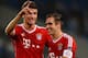 MANCHESTER, ENGLAND - OCTOBER 02: Thomas Muller and Philipp Lahm of FC Bayern Muenchen celebrates during the UEFA Champions League Group D match between Manchester City and FC Bayern Muenchen at Etihad Stadium on October 2, 2013 in Manchester, England. (Photo by Laurence Griffiths/Getty Images)