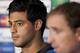 Real Sociedad's Carlos Vela, left, sits alongside coach Jagoba Arrasate during a press conference at Manchester United's Old Trafford Stadium, Manchester, England, Tuesday, Oct. 22, 2013. Real Sociedad will play Manchester United in a Champion's League Group A soccer match on Wednesday. (AP Photo/Jon Super)
