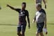 England's Raheem Sterling speaks with his manager Roy Hodgson during a squad training session for the 2014 soccer World Cup at the Urca military base in Rio de Janeiro, Brazil, Monday, June 9, 2014. (AP Photo/Matt Dunham)