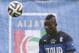 Italy's Mario Balotelli eyes the ball during a training session in the rain, in Mangaratiba, Brazil, Tuesday, June 10, 2014. Italy will play in group D of the Brazil 2014 soccer World Cup. (AP Photo/Antonio Calanni)