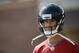 Atlanta Falcons quarterback Matt Ryan walks on the field during an NFL football organized team activity, Wednesday, June 4, 2014, in Flowery Branch, Ga. (AP Photo/David Goldman)