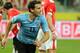 Uruguay's Christhian Stuani celebrates after scoring during a friendly soccer match between Austria and Uruguay, in Klagenfurt, Austria Wednesday, March 5, 2014. (AP Photo/Ronald Zak)