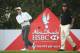 ABU DHABI, UNITED ARAB EMIRATES - JANUARY 16: Rory McIlroy of Northern Ireland watches his tee-shot on the 13th hole as Phil Mickelson of the USA looks on during the first round of the Abu Dhabi HSBC Golf Championship at the Abu Dhabi Golf Cub on January 16, 2014 in Abu Dhabi, United Arab Emirates. (Photo by Andrew Redington/Getty Images)