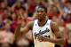 LAWRENCE, KS - JANUARY 18: Joel Embiid #21 of the Kansas Jayhawks reacts after scoring during the game against the Oklahoma State Cowboys at Allen Fieldhouse on January 18, 2014 in Lawrence, Kansas. (Photo by Jamie Squire/Getty Images)