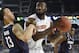 Apr 5, 2014; Arlington, TX, USA;Florida Gators center Patric Young (4) is defended by Connecticut Huskies guard Shabazz Napier (13) in the first half during the semifinals of the Final Four in the 2014 NCAA Mens Division I Championship tournament at AT&T Stadium. Mandatory Credit: Bob Donnan-USA TODAY Sports