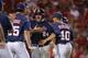 Mississippi infielder Sikes Orvis (24) reacts after scoring one of three runs on a fielding error in the ninth inning of an NCAA college baseball tournament super regional game in Lafayette, La.,Monday, June 9, 2014. Mississippi won 10-4 to advance to the College World Series. (AP Photo/Gerald Herbert)