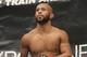 Defending Champion Demetrious Johnson warms up before fighting Joseph Benavidez for the UFC Flyweight Mixed Martial Arts title in Sacramento, Calif., on Saturday, Dec. 14, 2013.(AP Photo/Steve Yeater)