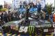 Kyle Busch celebrates in Victory Lane after winning the NASCAR Nationwide series auto race, Saturday, May 31, 2014, at Dover International Speedway in Dover, Del. (AP Photo/Molly Riley)