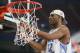 ST. LOUIS - APRIL 04: Rashad McCants #32 of the North Carolina Tar Heels celebrates by cutting down the nets after defeating the Illinois Fighting Illini 75-70 to win the NCAA Men's National Championship game at the Edward Jones Dome on April 4, 2005 in St. Louis, Missouri. (Photo by Ronald Martinez/Getty Images)