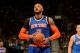TORONTO, CANADA - April 11: Carmelo Anthony #7 of the New York Knicks attempts a free throw against the Toronto Raptors on April 11, 2014 at the Air Canada Centre in Toronto, Ontario, Canada. NOTE TO USER: User expressly acknowledges and agrees that, by downloading and or using this Photograph, user is consenting to the terms and conditions of the Getty Images License Agreement. Mandatory Copyright Notice: Copyright 2014 NBAE (Photo by Ron Turenne/NBAE via Getty Images)