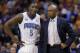 Orlando Magic guard Victor Oladipo (5) talks with coach Jacque Vaughn during the first half of an NBA basketball game against the Phoenix Suns, Wednesday, March 19, 2014, in Phoenix. (AP Photo/Matt York)