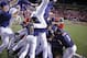 Mississippi celebrates their victory over Louisiana Lafayette during an NCAA college baseball tournament super regional game in Lafayette, La.,Monday, June 9, 2014. Mississippi won 10-4 to advance to the College World Series. (AP Photo/Gerald Herbert)