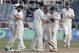 New Zealand's cricket player celebrate on the pitch at the end of their first cricket Test match against West Indies in Kingston, Jamaica, Wednesday, June 11, 2014. Zealand won by 186 runs (AP Photo/Arnulfo Franco)