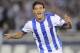 Real Sociedad's Carlos Vela of Mexico, left, celebrates after scoring his second goal against Olympique Lionnais during their Europa Champions League second leg, play-off soccer match, at Anoeta stadium in San Sebastian, northern Spain on Wednesday, Aug. 28, 2013. (AP Photo/Alvaro Barrientos)