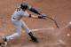 New York Yankees' Derek Jeter breaks his bat as he grounds out during the seventh inning of a baseball game against the Kansas City Royals Sunday, June 8, 2014, in Kansas City, Mo. (AP Photo/Charlie Riedel)