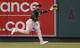 ANAHEIM, CA - JUNE 10: Left fielder Yoenis Cespedes #52 of the Oakland Athletics chases down a flyball off the bat of Mike Trout (not pictured) of the Los Angeles Angels of Anaheim for an out in the first inning to at Angel Stadium of Anaheim on June 10, 2014 in Anaheim, California. (Photo by Lisa Blumenfeld/Getty Images)