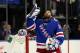 Jun 11, 2014; New York, NY, USA; New York Rangers goalie Henrik Lundqvist (30) puts on his mask before game four of the 2014 Stanley Cup Final against the Los Angeles Kings at Madison Square Garden. Mandatory Credit: Adam Hunger-USA TODAY Sports