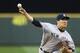New York Yankees starting pitcher Masahiro Tanaka throws against the Seattle Mariners in the fourth inning of a baseball game, Wednesday, June 11, 2014, in Seattle. (AP Photo/Ted S. Warren)