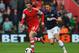 SOUTHAMPTON, ENGLAND - MAY 11: (L-R) Adam Lallana of Southampton holds off Michael Carrick of Manchester United during the Barclays Premier League match between Southampton and Manchester United at St Mary's Stadium on May 11, 2014 in Southampton, England. (Photo by Mike Hewitt/Getty Images)
