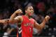 Toronto Raptors guard Kyle Lowry (7) reacts in waning minutes of the second half of Game 4 of an NBA basketball first-round playoff series against the Brooklyn Nets at the Barclays Center, Sunday, April 27, 2014, in New York. The Raptors evened the series at 2-2, defeating the Nets 87-79. (AP Photo/Kathy Willens)