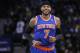 Mar 30, 2014; Oakland, CA, USA; New York Knicks forward Carmelo Anthony (7) smiles on the court against the Golden State Warriors in the first quarter at Oracle Arena. Mandatory Credit: Cary Edmondson-USA TODAY Sports