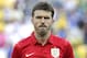 England's Michael Carrick stands during the playing of the British national anthem before the start of an international soccer friendly against Brazil at the Maracana stadium in Rio de Janeiro, Brazil, Sunday, June 2, 2013. (AP Photo/Victor R. Caivano)